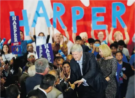  ?? Sean Kilpatrick/The Canadian Press ?? Conservati­ve Leader Stephen Harper and his wife, Laureen, shake hands with supporters during a rally in Brampton, Ont., on Monday. People attending such events are cleared in advance by party officials.