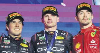  ?? ?? Red Bull Racing’s Max Verstappen (C) celebrates winning the Saudi Arabian Grand Prix alongside Sergio Perez (L) and Charles Leclerc at the Jeddah Corniche Circuit, Jeddah, Saudi Arabia, March 9, 2024.