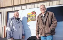  ?? EDDIE MOORE/JOURNAL ?? Brian Percy, left, and Barry Fancher are the new owners of Santa Fe Cider Works.