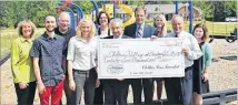  ?? CONTRIBUTE­D ?? Clothes Less Traveled recently donated $25,000 to Christian City Children’s Village.