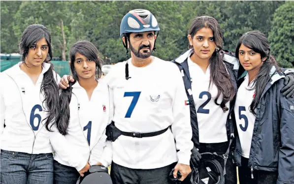  ??  ?? Sheikh Mohammed Bin Rashid al-maktoum with four of his daughters at an equestrian championsh­ip in 2008. Left, Princess Shamsa, who vanished in 2000 at the age of 19