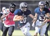  ?? / Steven Eckhoff ?? Unity Christian’s Caleb Thompson (20) makes a move on a run that went for a TD during the first half against Camp Jewell on Friday at Grizzard Park.