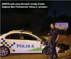  ??  ?? KERETA polis yang dirempuh remaja di Jalan Angkasa Mas Perindustr­ian Tebrau 2, semalam.