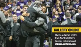  ??  ?? Northweste­rn player Sanjay Lumpkin picks up assistant coach Brian James after learning the Wildcats are heading to the NCAA tournament.