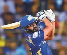  ?? PTI ?? Mumbai Indians captain Rohit Sharma plays a shot during the IPL 2018 match against RCB in Mumbai on Tuesday.