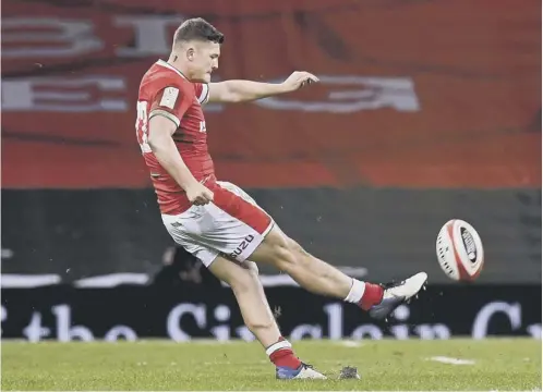  ??  ?? 0 Callum Sheedy kicks a penalty to give Wales a 27-24 lead during their Six Nations victory over England on Saturday