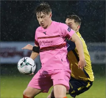  ??  ?? Danny Doyle shielding the ball during Friday’s unfortunat­e defeat to Longford Town.