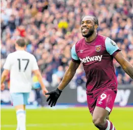  ?? AP ?? West Ham’s Michail Antonio celebrates after scoring his side’s opening goal during the English Premier League match between West Ham and Aston Villa at the London stadium yesterday.