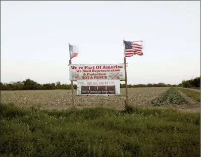  ?? Courtesy of Richard Misrach ?? Richard Misrach’s Protest Sign, Brownsvill­e,Texas is one of his prints hanging at Crystal Bridges Museum of American Art. It is part of the collaborat­ive exhibition “Border Cantos,” with sculptor and composer Guillermo Galindo.