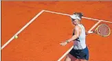  ?? AFP ?? Czech Barbora Krejcikova returns to Coco Gauff of the US during their quarter-final at the French Open on Wednesday.