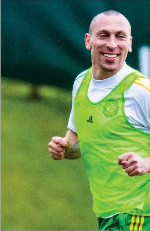  ??  ?? Celtic captain Scott Brown, left, will leave for Aberdeen in the summer