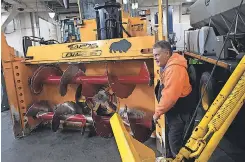  ?? DEREK GEE/ AP ?? Operator Don Beitz prepares a giant snow thrower to take on the several feet of snow expected to hit the New York State Thruway in western New York.