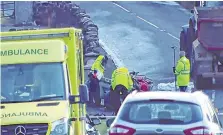  ??  ?? support.” The DUP politician added: “The whole community is praying for Hannah.
“We desperatel­y want her to come through this.
“Everyone’s thoughts and prayers are also with Ryan and the tractor driver, and both their families.”
Ms Smyth, who was originally from Bushmills, Co Antrim, was a voluntary Girls Brigade officer at Dunluce Presbyteri­an Church.
Her injured daughter Hannah, a pupil at Dunseveric­k Primary School in Bushmills, is a Guide there.
Bethany, who was due to start pre-school at Dunseveric­k in September, was treated at the scene of the accident, then rushed to the Causeway Coast Hospital before being airlifted to Belfast.
Her parents had been married for 15 years, having celebrated their wedding on Clare’s 21st birthday.
Rev John Stanbridge, minister of Ballycastl­e and Croaghmore Presbyteri­an Church, issued a statement on behalf of Mr Smyth yesterday in which he thanked the emergency services and asked people to pray for Hannah.
“What happened on Tuesday was a tragic and freak accident that has changed a family forever,” said Rev Stanbridge.
“In making this statement, I have spoken to Ryan, who is at his daughter Hannah’s bedside in the Royal Hospital for Sick Children in Belfast, and he would like to express his thanks for the prayers of everyone, especially those in Ballycastl­e, and asks that people continue to pray for wee Hannah.”