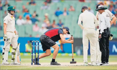  ?? GETTY IMAGES ?? Australia captain Steve Smith (left) and England skipper Joe Root had hit out at the lifeless dropin pitch at MCG after the fourth Test was drawn.