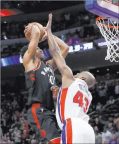  ?? Carlos Osorio ?? The Associated Press Raptors guard Demar Derozan (10) is fouled by Detroit Pistons forward Anthony Tolliver (43) during the second half on Wednesday in Detroit.