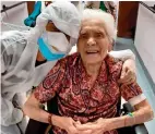  ?? AP ?? BACK TO LIFE: Ada Zanusso with a nurse at the old people’s home Maria Grazia’ in Lessona, Italy, after recovering from Covid-19 infection. —