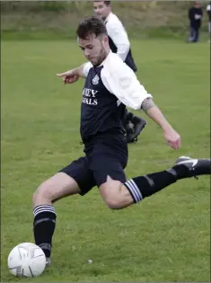  ??  ?? Karl Carthy on the ball for Newtown United ‘B’.