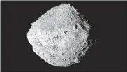  ?? OF ARIZONA/CSA/YORK/MDA VIA THE ASSOCIATED PRESS] ?? This undated image shows the asteroid Bennu from the OSIRIS-REx spacecraft. After almost two years circling the ancient asteroid, OSIRIS-REx will attempt to descend to the treacherou­s, boulder-packed surface and snatch a handful of rubble on Tuesday. [NASA/GODDARD/UNIVERSITY