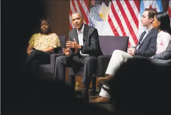  ?? Zbigniew Bzdak / Chicago Tribune ?? Former President Barack Obama speaks to students at the Logan Center for the Arts on the University of Chicago campus. He led a panel discussion on civic engagement.