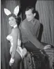  ?? AP PHOTO/ED KITCH, FILE ?? In this 1961 file photo, Hefner poses with "bunnygirl" hostess Bonnie J. Halpin at Hefner's nightclub in Chicago.