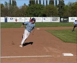  ?? JUSTIN COUCHOT — ENTERPRISE-RECORD ?? Pleasant Valley’s Sean Stevens prepares to round third base in the bottom of the third inning in the Vikings’ home game against Chico on April 1.