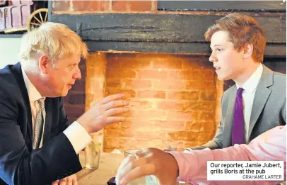  ?? GRAHAME LARTER ?? Our reporter, Jamie Jubert, grills Boris at the pub