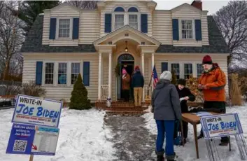  ?? JOHN TULLY/THE NEW YORK TIMES ?? A get-out-the-vote event for Biden at a home in Concord, N.H., Jan. 20.