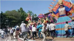  ?? — PTI ?? Police lathicharg­e mining industry workers during their protesting in Panaji on Monday.