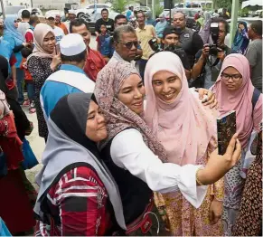  ??  ?? Serving the people: Will the new leaders, like PKR Permatang Pauh assemblyma­n Nurul Izzah Anwar, still maintain their rakyat-friendly attitude and accessibil­ity now that they are in power?