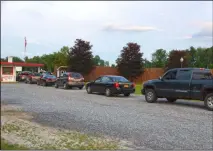  ?? FILE PHOTO ?? Vehicles line up down the long driveway and along Route 9to enjoy night out at the Malta Drive-In Theatre.