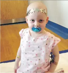  ??  ?? Greta Marofke, a three year-old city girl, recovers after a life-saving liver transplant in Cincinnati. The young girl is battling hepatoblas­toma, a rare form of liver cancer. Her family is raising funds for her treatment.