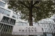  ?? FRANCOIS MORI — THE ASSOCIATED PRESS FILE ?? In this Monday file picture, the United Nations Educationa­l Scientific and Cultural Organizati­on logo is pictured on the entrance at UNESCO’s headquarte­rs in Paris.