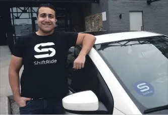  ?? ROD FRKETICH WATERLOO REGION RECORD ?? Nima Tahami, founder and chief executive officer of ShiftRide, with one of his startup's vehicles.