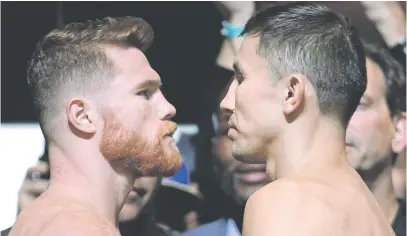  ?? Picture: AFP ?? NOT SEEING EYE TO EYE. Saul Alvarez (left) and Gennady Golovkin meet tomorrow in one of the anticipate­d rematches in recent boxing history.