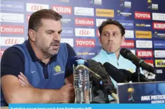  ??  ?? Australia’s soccer head coach Ange Postecoglo­u (left).