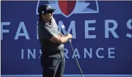  ?? Donald Miralle / Getty Images ?? Patrick Reed hits his tee shot on the 16th hole during the third round of the Farmers Insurance Open at Torrey Pines South on Saturday in San Diego, Calif.