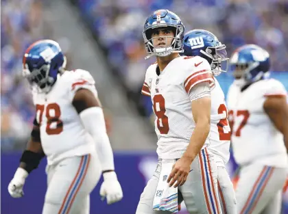  ?? ADAM HUNGER/AP ?? New York Giants quarterbac­k Daniel Jones (8) walks off the field against the Los Angeles Rams during Sunday’s game in East Rutherford, N.J.