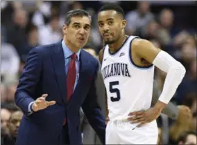  ?? NICK WASS - THE ASSOCIATED PRESS ?? FILE - In this Wednesday, Feb. 20, 2019, file photo, Villanova head coach Jay Wright talks with guard Phil Booth (5) during the first half of an NCAA college basketball game against Georgetown in Washington. Villanova opens their Big East conference tournament play on Thursday, March 14, 2019.