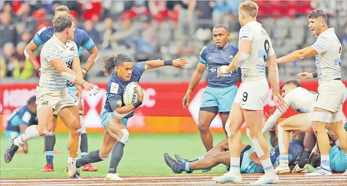  ?? Picture: TRYSPORTIM­AGES ?? Manueli Maisamoa tries to look for space against Argentina in their quarter-final match.