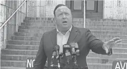  ?? ALYSSA VIDALES/AMERICAN-STATESMAN ?? Alex Jones will have to pay damages to parents of children killed in the 2012 mass shooting at Sandy Hook Elementary School, after a Connecticu­t judge’s ruling.