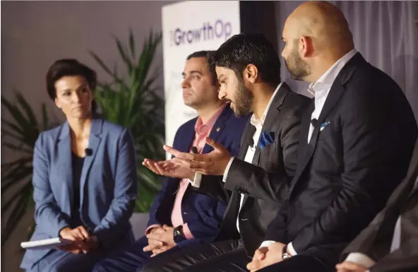  ?? TYLER ANDERSON ?? Navdeep Dhaliwal of Supreme Cannabis, second from right, speaks about the global pot economy in Toronto in June. Dhaliwal’s company is betting on growth in Lesotho.