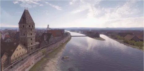  ?? FOTOS: INTERACTIV­E MEDIA FOUNDATION ?? An der Donau entlang: Historisch­er Blick auf den Ulmer Metzgertur­m.