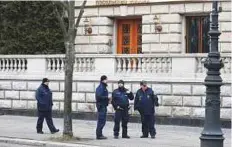  ?? AFP ?? ■ Policemen stand in front of the Russian embassy in Berlin yesterday after Germany expelled four Russian diplomats.