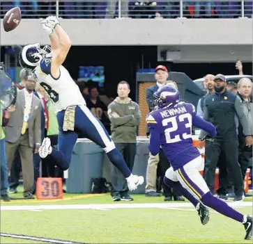  ?? Jim Mone Associated Press ?? A PASS gets past the Rams’ Cooper Kupp in the second half. He finished with six receptions for 64 yards.