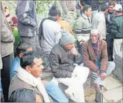  ?? HT FILE PHOTO ?? MS Dhoni’s father, Pan Singh (in the grey cap), at their ancestral village, Lawali, in Almora district.
