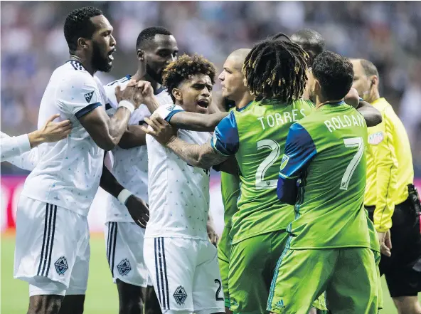  ?? — CP FILES ?? The Vancouver Whitecaps and Seattle Sounders mixed it up Sunday but neither could score in the first leg of the MLS Western Conference semifinal, setting up Thursday’s second-leg match at CenturyLin­k Field in Seattle as a winner-take-all affair.