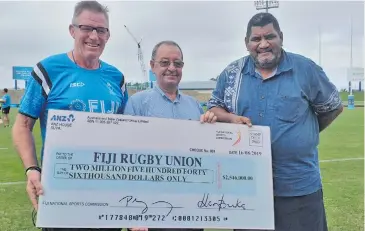  ?? Photo: Sheldon Chanel ?? From left: Fiji Airways Flying Fijians head coach John McKee, Fiji National Sports Commission executive chairman Peter Mazey and Fiji Rugby Union chief executive officer John O’Connor during the cheque handover at Suva’s ANZ Stadium on August 22, 2019.