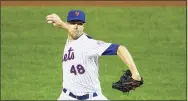  ?? Mike Stobe / Getty Images ?? Jacob deGrom of the New York Mets pitches in the first inning against the Tampa Bay Rays at Citi Field on Sept. 21 in New York. DeGrom is up for his third consecutiv­e NL Cy Young Award.