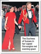  ??  ?? The Duchess of Sussex in her caped fire-engine red evening gown