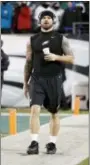  ?? CHRIS SZAGOLA - AP ?? The Eagles’ Chris Long walks the field before Monday’s game against the Oakland Raiders.